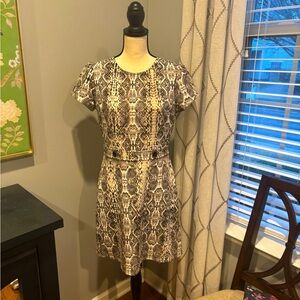 Looks great with tall boots and with a blazer. Work to dinner dress.